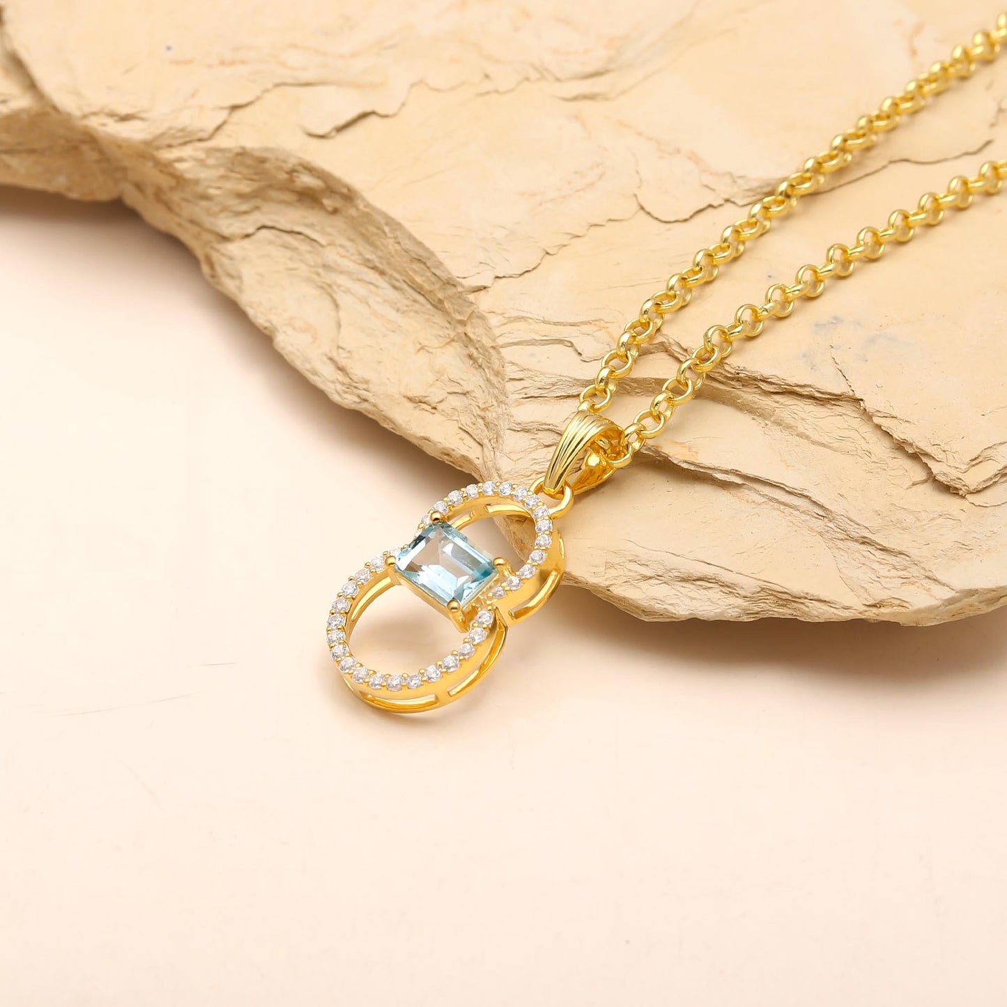 Infinity Blue Topaz Pendant